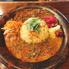 YOLO - ヨロスパイスチキンカレーとポルチーニココナッツチキンカレーのあいがけ♪