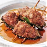 Meat stuffed green peppers grilled with teriyaki soy sauce