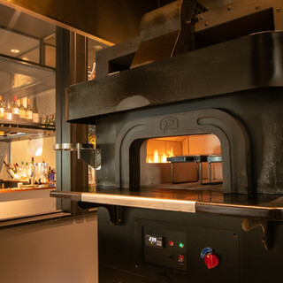 Baking in a stone oven concentrates the original flavor of meat, vegetables, and seafood!