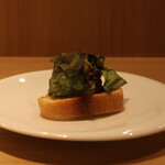 RISTORANTE IL NODO - 小坪漁港の活サザエ アーモンドバター壺焼き 渡辺農園のふだん草