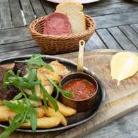 リオ・ブルーイング・コー ビストロアンドガーデン 東京ミッドタウン - 本日の3種石窯ローストグリル盛り合わせ