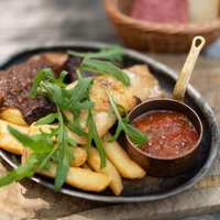 リオ・ブルーイング・コー ビストロアンドガーデン 東京ミッドタウン - 本日の3種石窯ローストグリル盛り合わせ