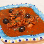 Lucia style octopus stew with spicy tomatoes