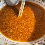 ラーメン もっけだの - 赤唐味噌中華普通ニンニクショウガ食べるラー油のスープ