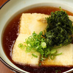 Boiled tofu flavored with dashi soup