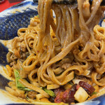 担担麺専門店 DAN DAN NOODLES. ENISHI - いろいろ絡んでる麺