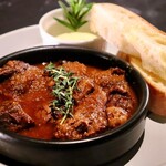 Stewed beef in red wine with baguette