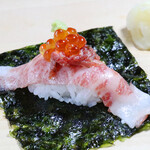 Sankai hand-rolled Sushi Kuroge Wagyu beef + salmon roe