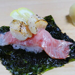 Sankai hand-rolled Sushi Kuroge Wagyu beef + scallops