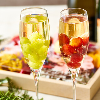 Celebrate with fruit champagne and flower art plates.