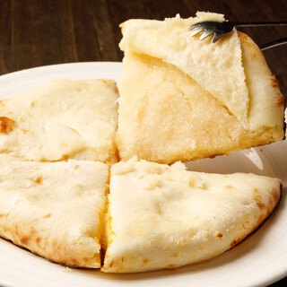 Enjoy freshly baked naan from a tandoori oven and a variety of other Asian dishes.