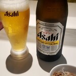 らーめん つけめん 満帆 - 瓶ビール。お通しのメンマがなんか……。