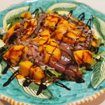 Sweet and salty salad with Prosciutto, mango, and arugula