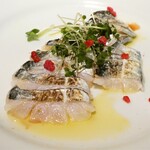 イタリア食堂 DecoBocco - 豊洲より 鮮魚（タチウオ）のカルパッチョ