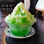 蔵cafe沙羅 - かき氷（メロン）練乳かけ　350円