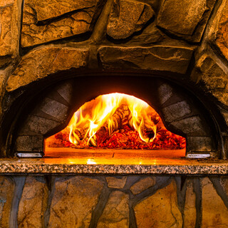 Craftsmen bake it in a wood-fired oven