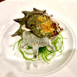 海のごちそう WATANABE - 地サザエのブルギニヨン。
                                大きなサザエ。ガーリックの香りが食欲をそそります。ワインが進むお味。