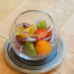 Colorful tomatoes and onions served with Tosa vinegar