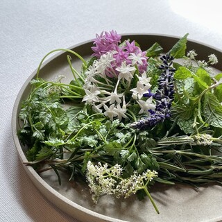 We offer farm-fresh vegetables, herbs, and edible flowers.