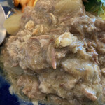 BAR NICO - 沖縄ソーキグリーンカレー接写！
            具材はソーキとじゃがいも。よく煮込まれた肉はグレービーに溶け込んで旨味に昇華してます。