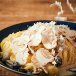 Creamy pasta with plenty of truffle-scented mushrooms and capers