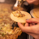 もんじゃ 大樹 - トッピング　ソースせんべい