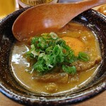 外呑・立呑・座呑処 新橋へそ - 牛すじのどて煮込み卵黄添え
