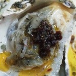 居酒屋 兀突骨 - 殻付き生牡蠣のカルパッチョ風