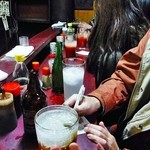 米山 - 紙にツマミを書いているところ…