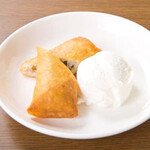Fried banana spring rolls with coconut ice cream