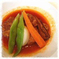 ブラッスリー ポール・ボキューズ 大丸東京 - 子羊の肩肉と野菜のトマト煮込みクスクス添えなり。