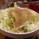 カレー屋ドムドム - 玉ねぎのドレッシングが美味しいサラダ200円