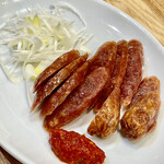 かつぎや - 腸詰は注文を受けてから一本一本焼いて出します