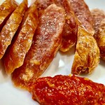 かつぎや - この独特の香り高い豆板醤が病みつきになります