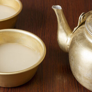 Try Korean drinks! We recommend the ``Namakkori'' served in a kettle.