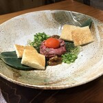 Gyuutoro Yaki Shabu Semmon Tenjuu Nimatsu Rokuzaemon - ・黒毛和牛のユッケ風