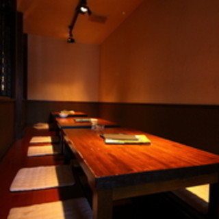 A raised kotatsu-style seating area for up to 12 people