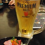 Motsusui - 生ビール＆お通しはハマチのカルパッチョ