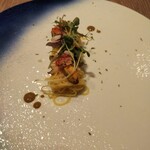 Reglisse - 前菜：魚介のカッペリーニ。ムール貝の出汁を纏った麺に鮑  オマール  烏賊  キャビアと豪華海鮮丼的な仕立て。  キノシタのオマージュかな？