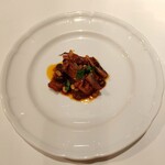 オステリア・オ・ジラソーレ - ルチャーナ風スルメイカの煮込み