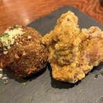 俺のワイン酒場 - ハンバーグ屋さんのメンチカツと鶏のガーリック２種盛り