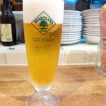 バール トレンタ トレ - 生ビールはキリン・ハートランド（￥680）。クリーミーな泡とホップの香りが際立つ