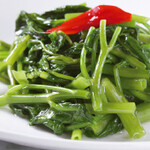 Stir-fried seasonal green vegetables