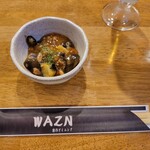 ダイニング WAZN - お通しの麻婆茄子。