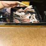 おかめ - ゲソ、焼いてます♥️