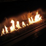 グリルうかい - 入口では、本物の炎が出迎えてくれます