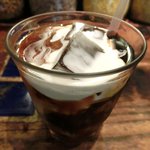 スパイスカフェ - ペアカレーランチ(+牡蠣) 1650円 のアイスコーヒー