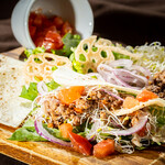 Wagyu beef bolognese and tomato taco salad