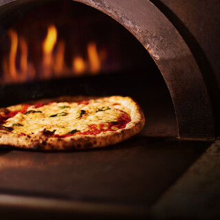 Our proud stone oven baked Neapolitan pizza