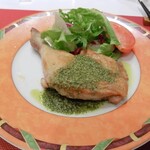 レストランファミーユ - 料理写真:骨付きもも肉のソテー　バジルソース
